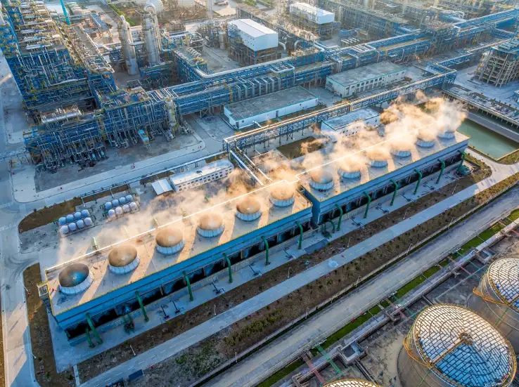 An aerial view of an industrial sized cooling tower.