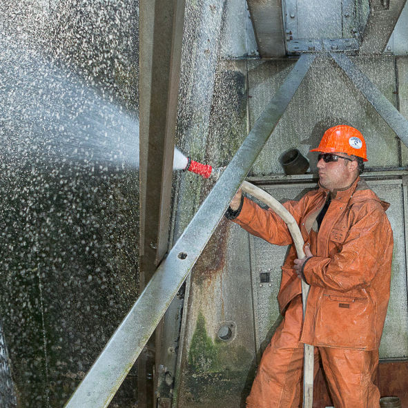 A Landover Cooling Tower Technician Cleaning a Cooling Tower at Rutgers, Piscataway, NJ