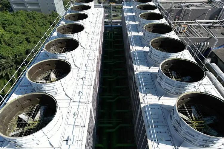 Aerial view of a data center cooling tower system that is ready and functional for warmer weather.